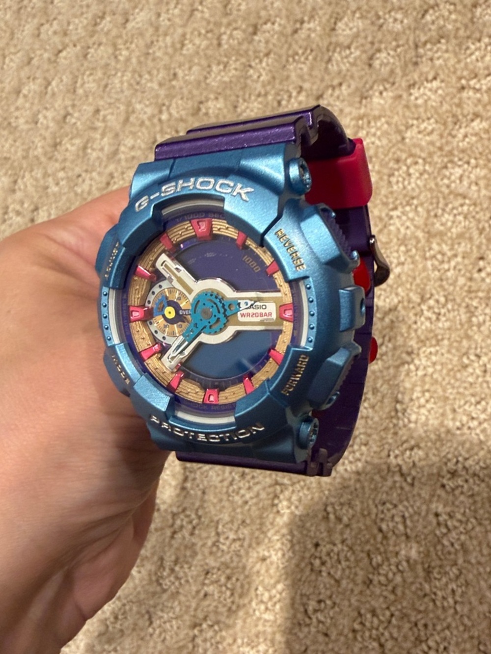 G-Shock Metallic Blue Watch with Pink & Purple Accents